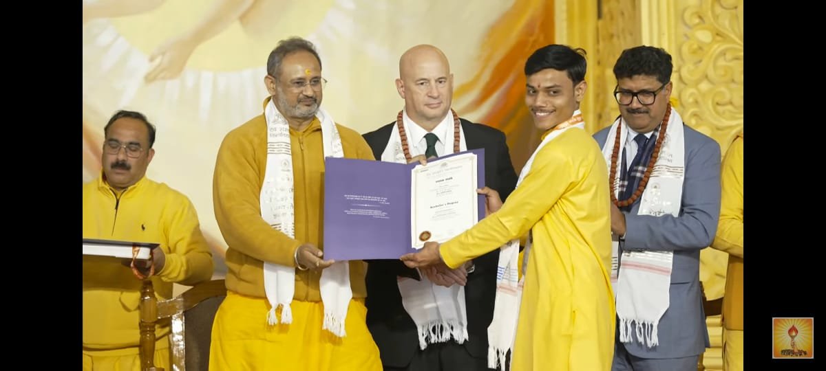 Deepak Receiving Award